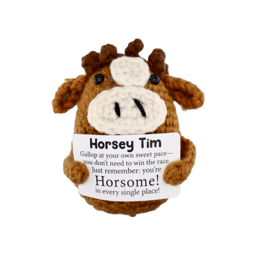 Crochet brown horse decoration holding a positive horsey tim message card