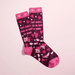 Overlapped burgundy women’s crew socks with pink heels, hearts and bedtime icons, slogan Hot girls are in bed by nine.