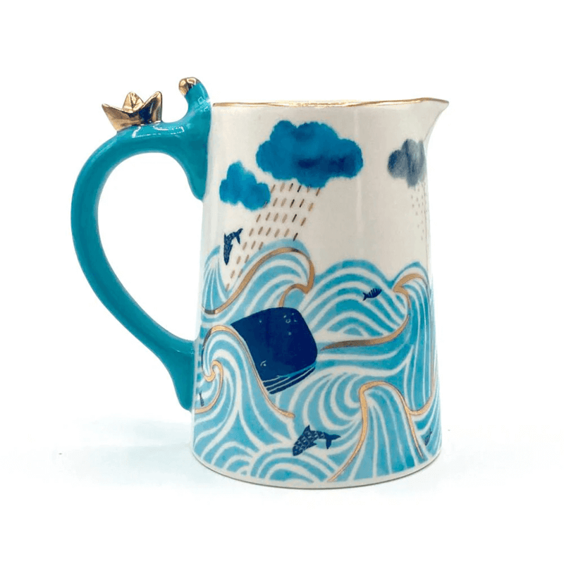 Rear view showing stormy waves, whales and cloud detail on the porcelain jug