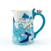 Front view of the By The Sea Whale Jug showing sail away with me text, waves and gold detailing