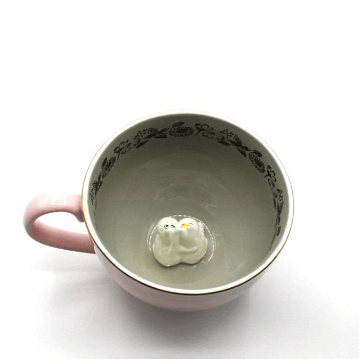 Rear angled top view of House of Disaster Moomin Love cup with hidden 3D character detail inside