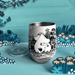 Open House of Disaster Moomin Love keep cup with lid removed in a blue floral display setting