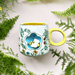 Lifestyle photo of the Secret Garden 3D Bee Cup styled with greenery