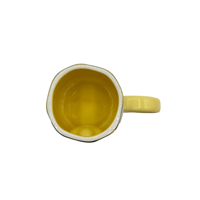 Top view of the cup showing the glossy yellow glazed interior