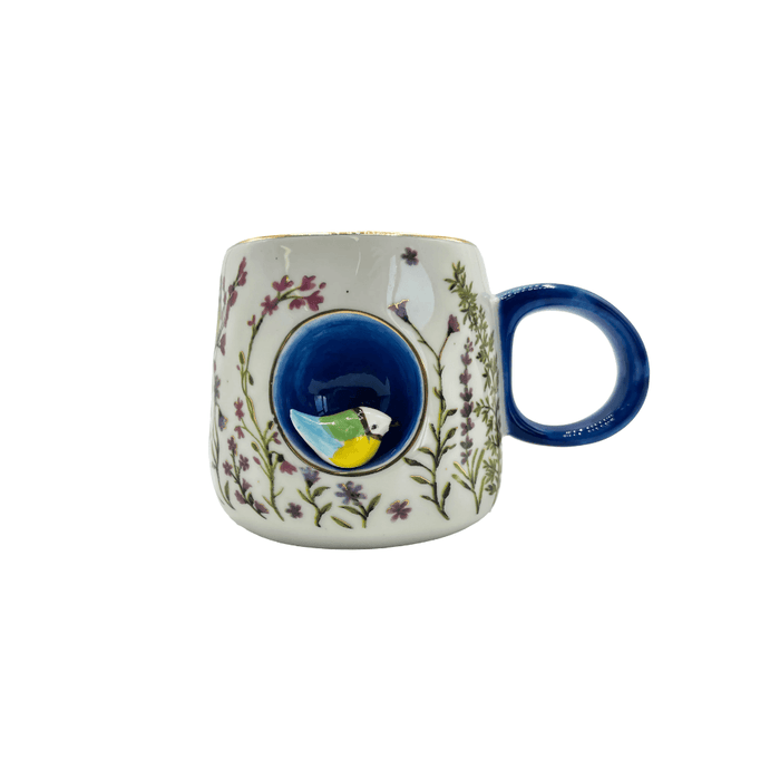 Isolated front view of the cup highlighting the blue nook and 3D bird feature