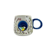 Isolated front view of the cup highlighting the blue nook and 3D bird feature