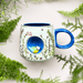 Lifestyle photo of the Secret Garden 3D Bird Cup styled with greenery