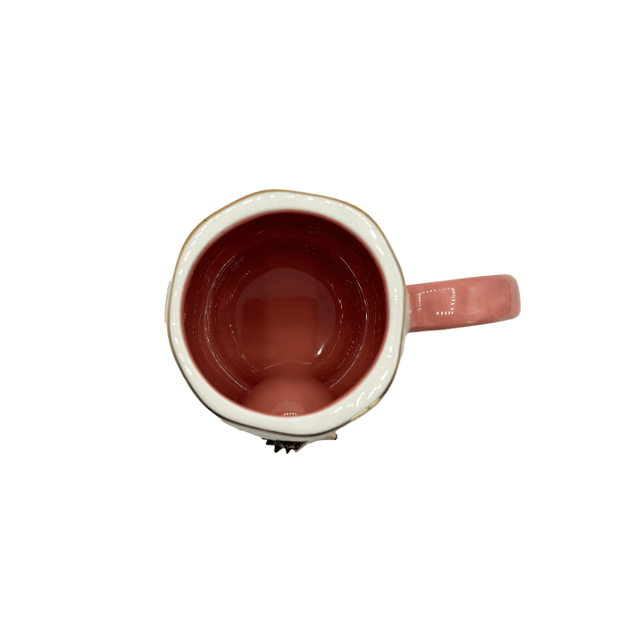 Top view of the cup showing the glossy pink glazed interior