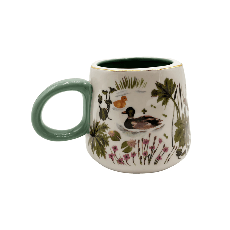 Back view of the Secret Garden mug with illustrated ducks, flowers and pond plants