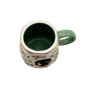 Top view of the Secret Garden Duck Mug showing its deep teal glazed interior