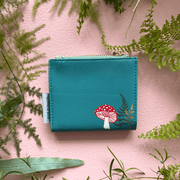 House of Disaster Secret Garden Hedgehog Purse, back view with mushroom print on pink background