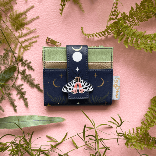 House of Disaster Secret Garden Moth Purse foldover cardholder, front view on pink background