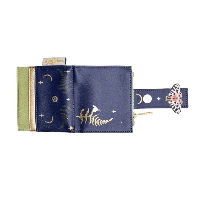 House of Disaster Secret Garden Moth Purse open, showing moon and star print on white background
