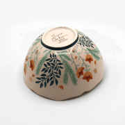 Base of the bowl showing the Secret Garden branding and product mark underneath