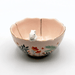 Front view of the flower-shaped bowl with gold rim detailing and rabbit figure