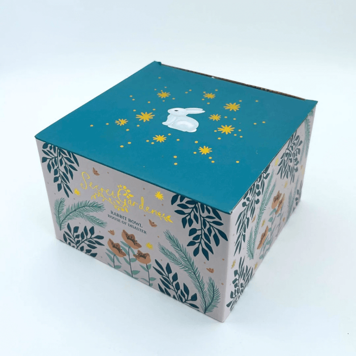 Gift box packaging for the Secret Garden Rabbit Bowl with gold details on the box