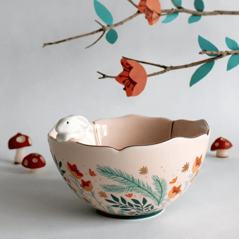 Lifestyle photo of the Secret Garden Rabbit Bowl styled with floral decor