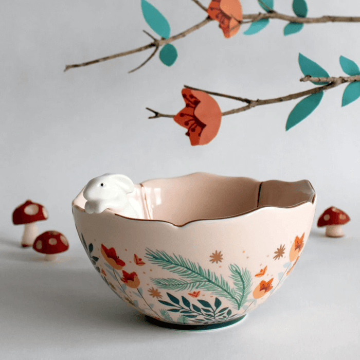Lifestyle photo of the Secret Garden Rabbit Bowl styled with floral decor