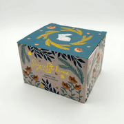 Printed gift box for the Secret Garden Rabbit Cup with gold details on the packaging