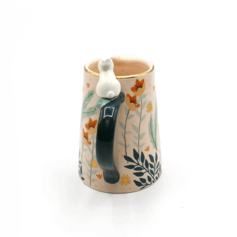 Rear view of the jug focusing on the handle and the rabbit perched at the top