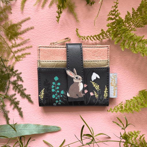 House of Disaster Secret Garden Rabbit Purse foldover cardholder, front view on pink background