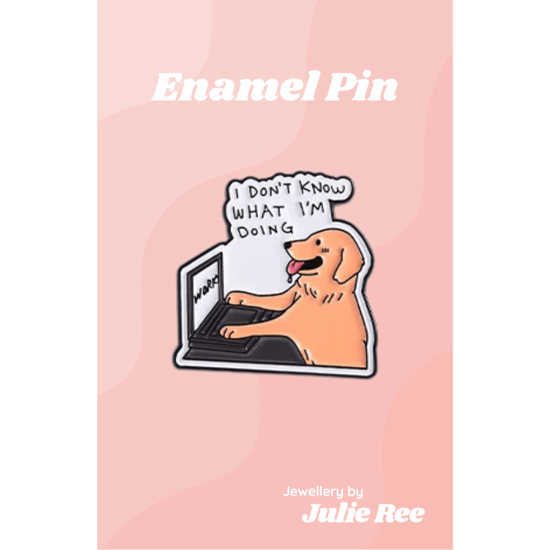 Funny enamel pin of a dog typing on a laptop with the quote I don’t know what I’m doing