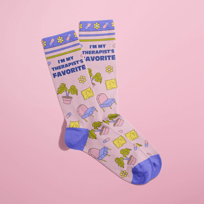 Angled view of I’m My Therapist’s Favourite women’s novelty socks in pink with blue heel and toe
