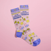 Angled view of I’m My Therapist’s Favourite women’s novelty socks in pink with blue heel and toe