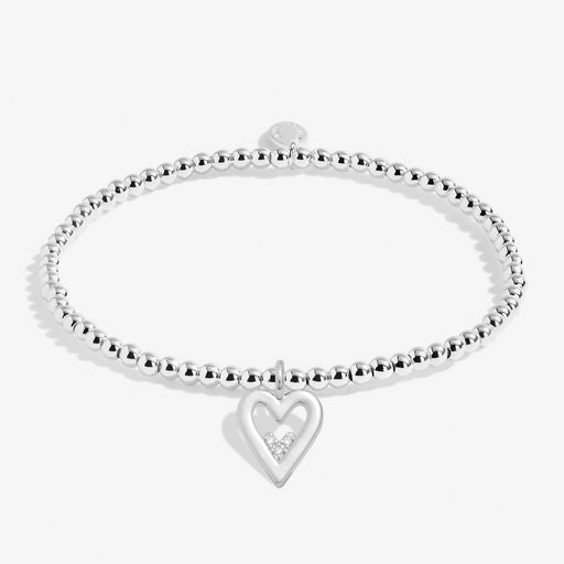 Joma A Little Happy Birthday Daughter Bracelet laid flat, silver-plated beaded stretch Bracelet with heart charm.