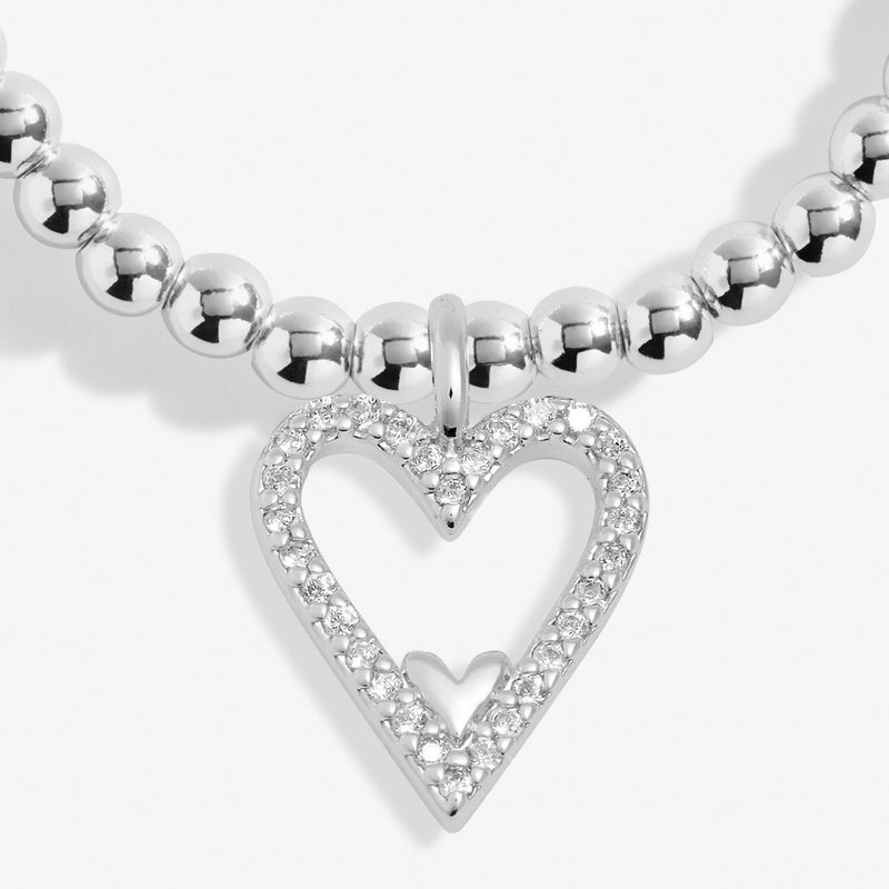 Close-up of Joma Happy Birthday Mum bracelet open heart charm