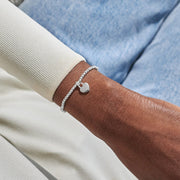 Joma A Little Lots Of Love Bracelet worn on wrist