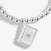 Close-up of Joma Jewellery New Chapter bracelet book charm