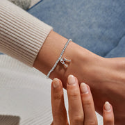 Joma A Little Sip Sip Hooray Birthday Bracelet worn on wrist