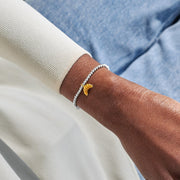Joma A Little Vibes Babes Who Brunch Bracelet worn on wrist