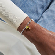 Joma A Little Vibes Hello Summer Bracelet worn on wrist
