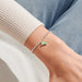 Silver-plated beaded Bracelet worn on wrist with green matcha drink charm and straw detail