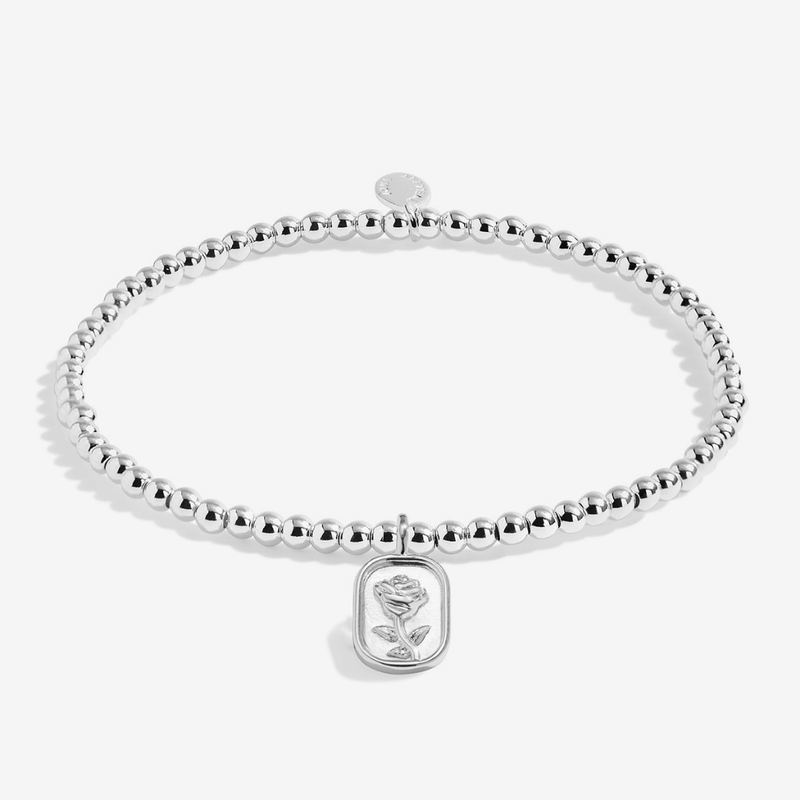 Silver-plated Joma Jewellery affirmation bracelet with rose medallion