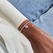 Silver-plated Joma Jewellery beaded Bracelet worn on wrist with heart charm featuring a tiny crystal heart, Amazing Mum To Our Family.