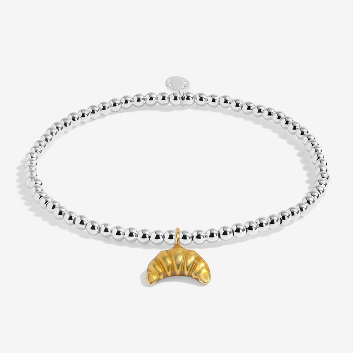 Joma silver-plated stretch Bracelet with croissant charm shown on a white background