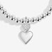 Close-up of double heart charm with sparkling pavé heart on silver-plated beaded Bracelet