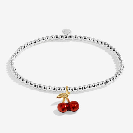 Joma silver-plated stretch Bracelet with red cherry charm shown on a white background