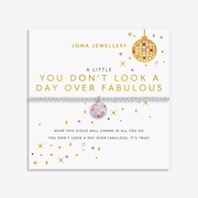 Joma You Don’t Look A Day Over Fabulous bracelet on its illustrated sentiment card