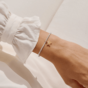 Joma Jewellery family star bracelet worn on a wrist