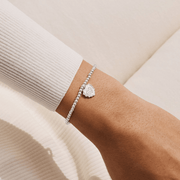 Joma Jewellery Family Is the Heart of Christmas Bracelet worn on the wrist