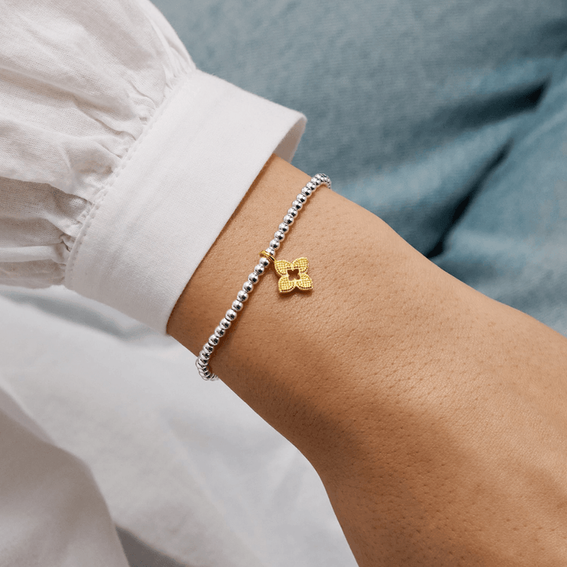 Joma Jewellery friendship flower bracelet worn on a wrist