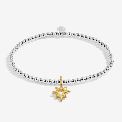 Joma stretch Bracelet with silver beads and gold star charm displayed on a white background
