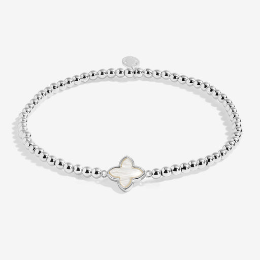 Joma silver-plated stretch Bracelet with mother of pearl clover charm displayed on a white background