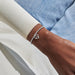 Silver-plated Joma Jewellery beaded Bracelet worn on wrist with open double heart charm, Happy First Mother’s Day gift for a new mum.