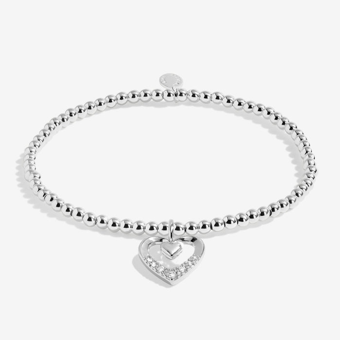 Full view of the Joma Jewellery A Little Happy Mother’s Day Bracelet, silver-plated beaded stretch Bracelet with heart charm.