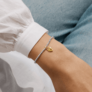 Joma Jewellery heart padlock bracelet worn on a wrist